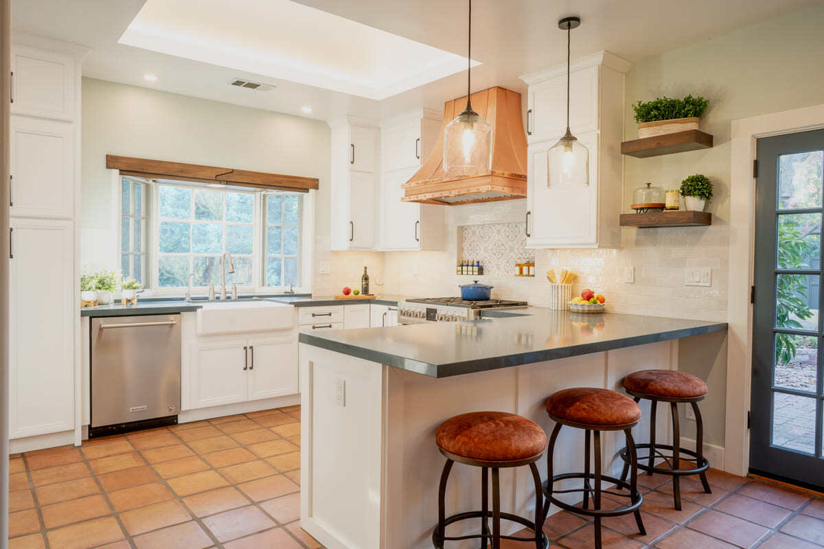 Kitchen remodel in Fresno with white cabinets by Imagine Remodeling